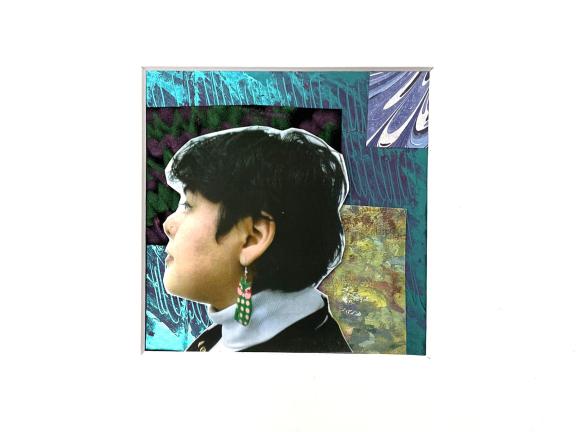 A collage with the head of a person in profile in the forefront, with patches of blue-toned textured and marbled paper in the background, in a matted white frame
